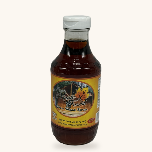 Pint glass bottle of Skarda Maple Farms pure maple syrup