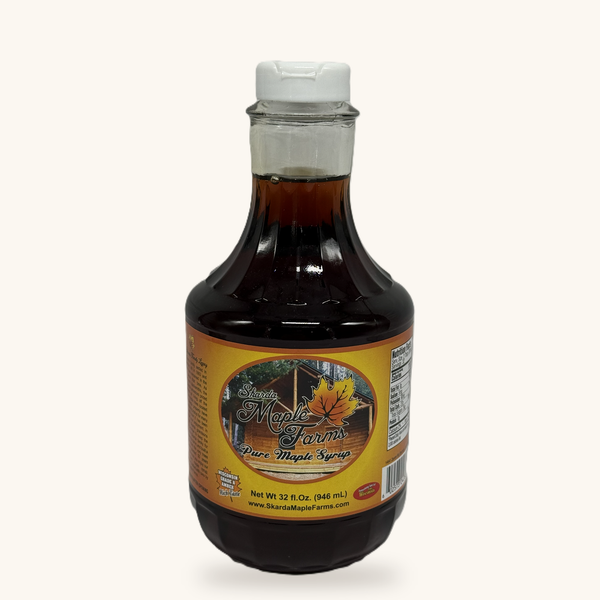 Quart glass bottle of Skarda Maple Farms pure maple syrup
