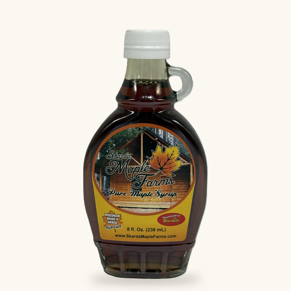 8 oz glass bottle of Skarda Maple Farms pure maple syrup